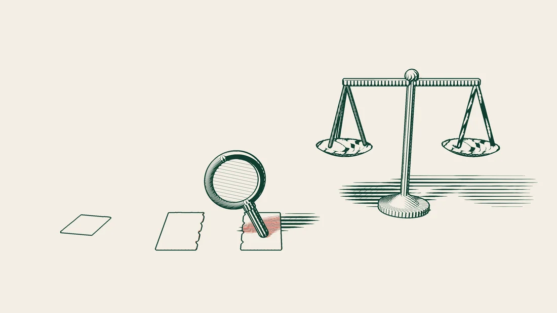 A large blank award page torn in two is examined under a magnifying glass, beside a short blank list and a pair of scales.