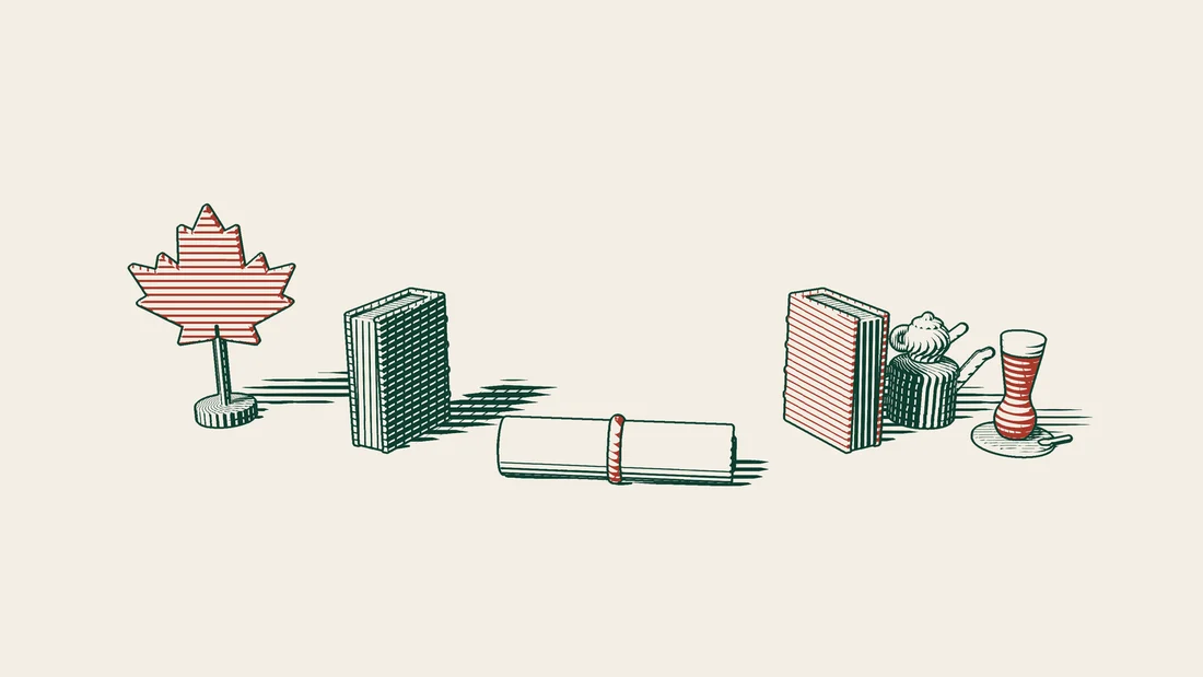 A ribboned contract scroll between two books, a green-bound one beside a red maple leaf and a red-bound one beside a Turkish tea set.