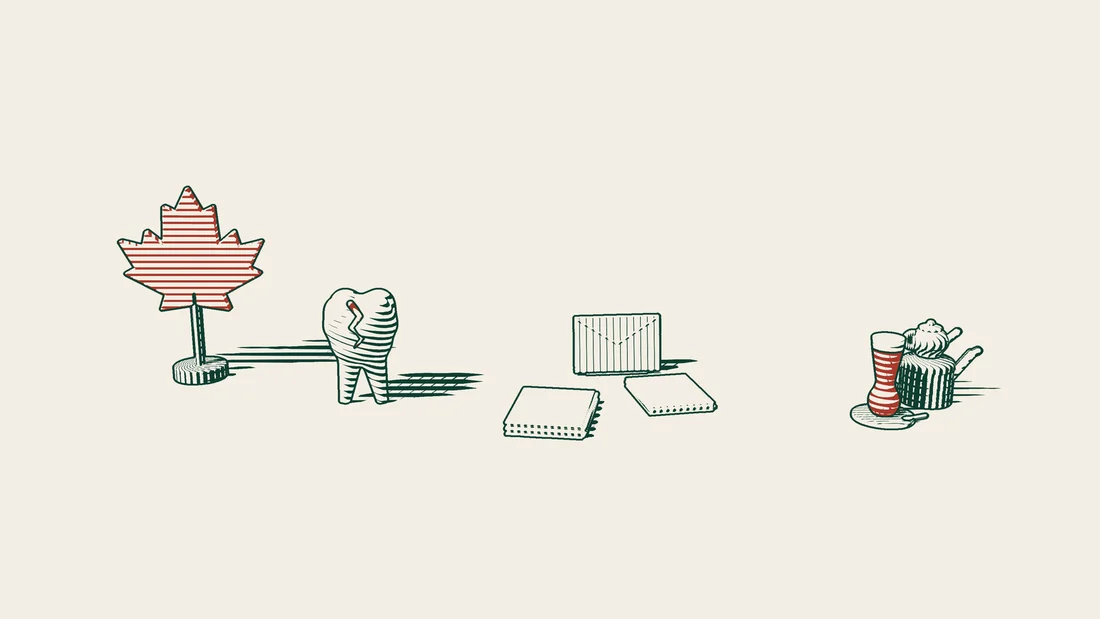 A cracked tooth model beside stacks of blank papers and an envelope, with a red Canadian maple leaf on one side and a Turkish tea set on the other.