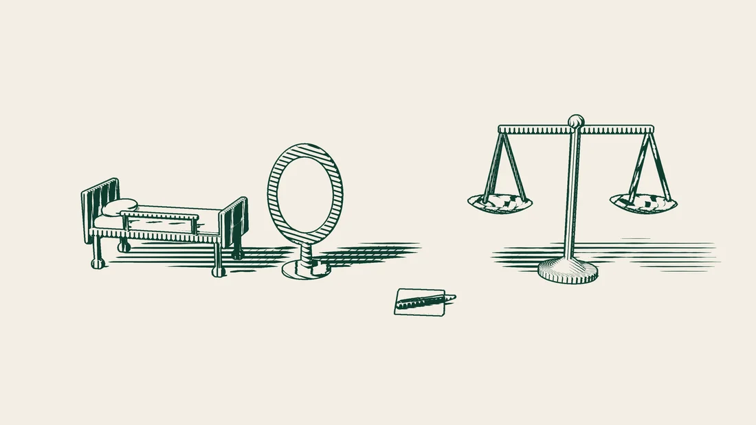 A standing mirror and a patient bed, with a blank consent form and a fountain pen in front and a pair of scales beside them.