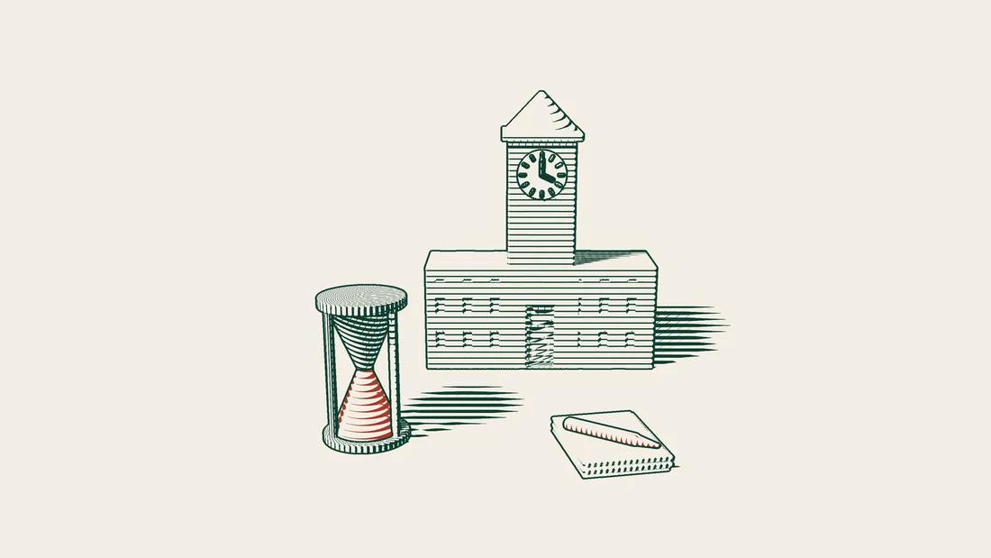 An hourglass and a stack of blank sheets with a fountain pen stand in front of a town hall with a clock tower.