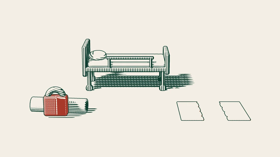 Two ribboned documents in front of a hospital bed, one shut with a large red padlock and the other torn in half.