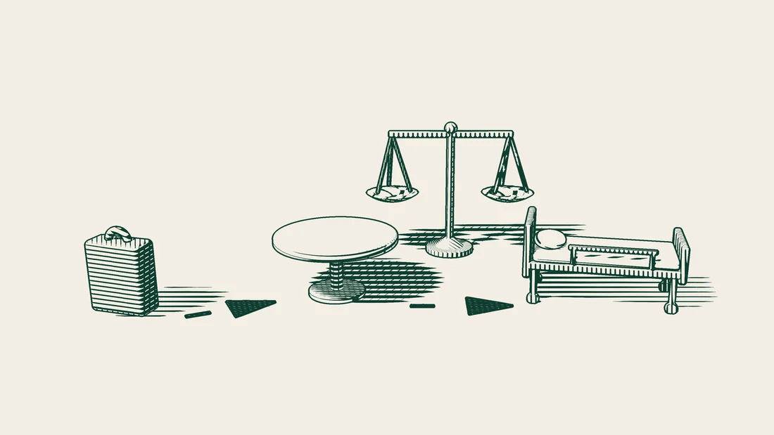 A suitcase with a dashed arrow to a round table, then on to a hospital bed, with a pair of scales standing behind the table.