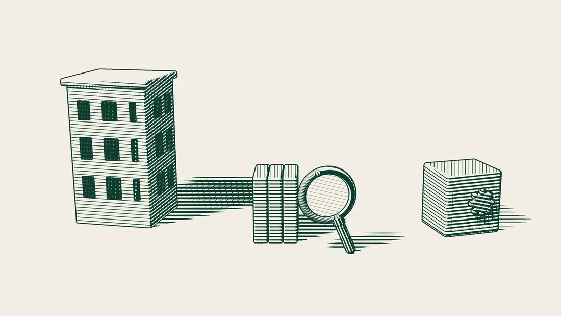 File folders examined under a magnifying glass in front of an office building, with a steel safe with a plain dial beside them.