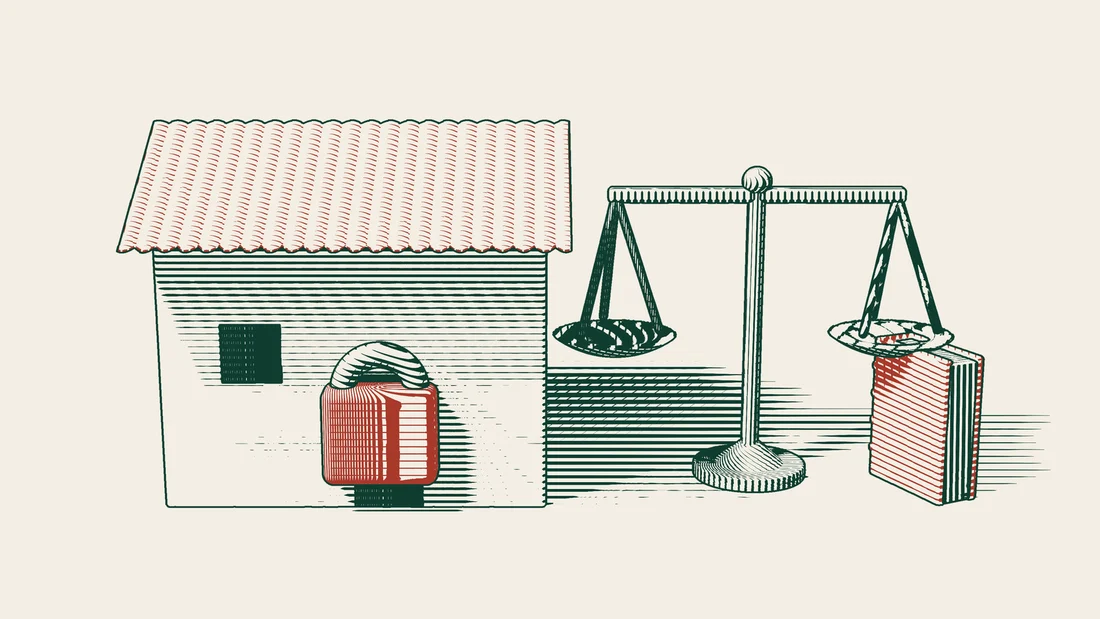 A red padlock hangs on the door of a tiled-roof house, with scales of justice and a red-bound book beside it.