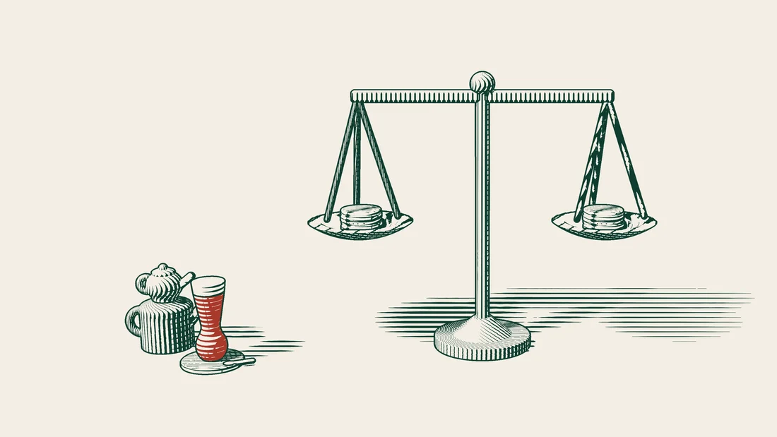 A pair of scales with stacks of coins of equal height in both pans, the beam resting perfectly level.
