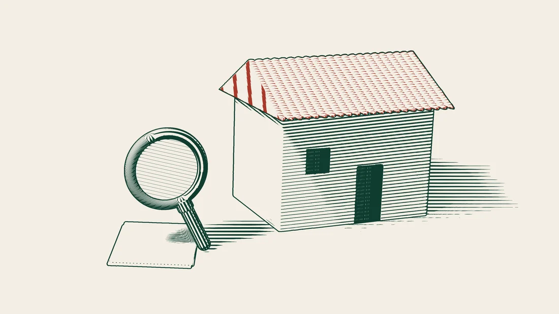 A blank title deed and a tiled-roof house stand side by side with a magnifying glass between them.