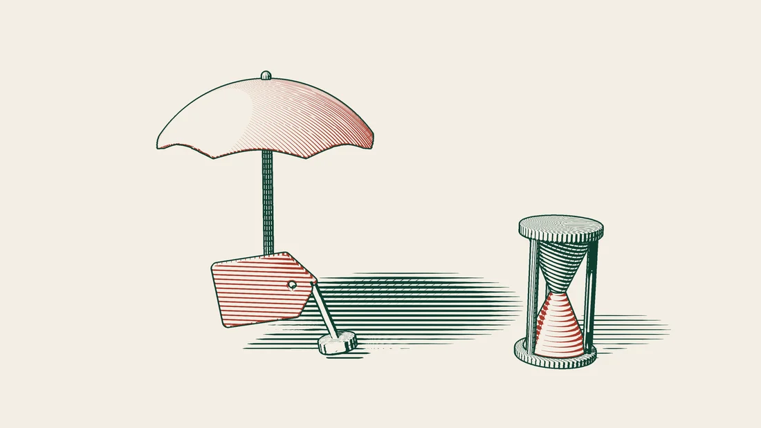 Under an open umbrella sits a red brand label, with an hourglass beside it.