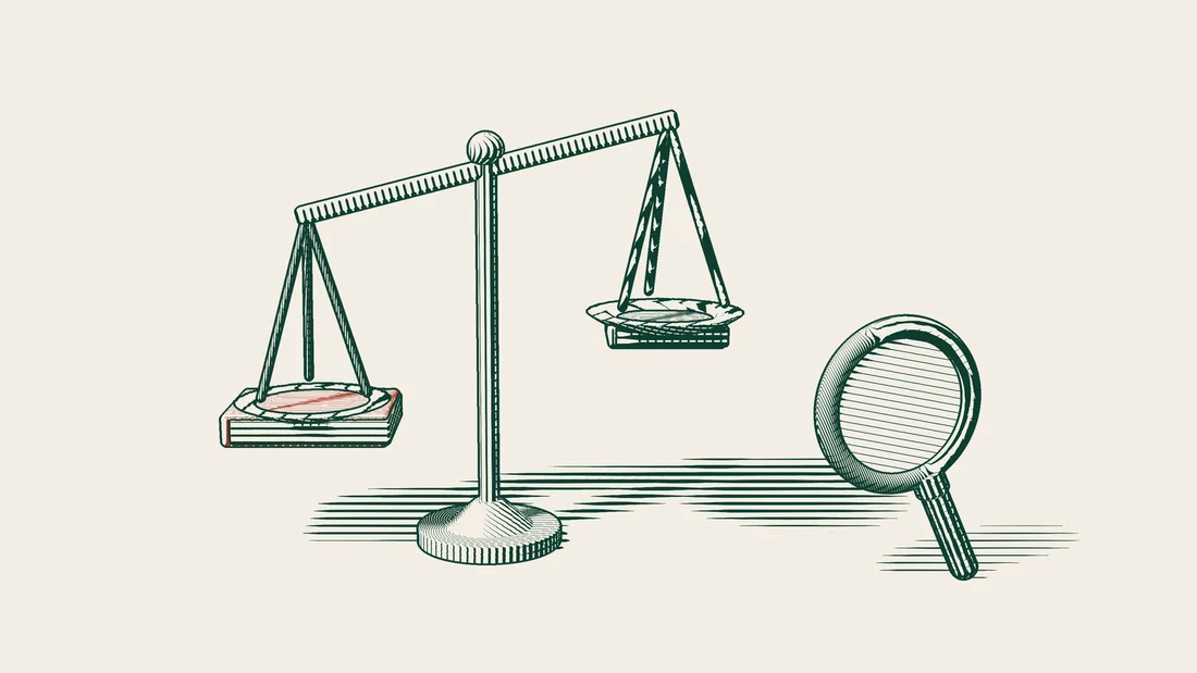 A balance scale whose lower left pan holds a thick red book and whose raised right pan holds a thin plain book, with a magnifying glass beside it.