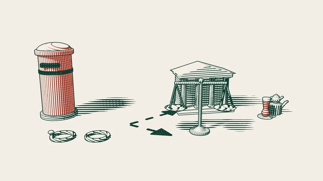 A large red postbox and two separated rings, with a path splitting toward a columned building and a pair of scales, and a Turkish tea set behind.