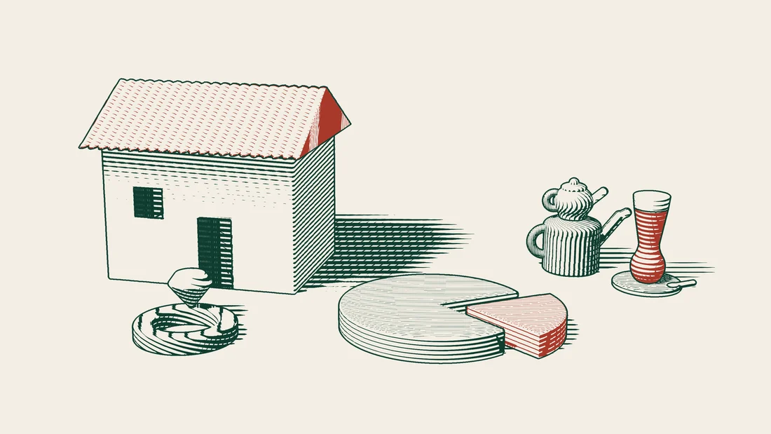 A sliced disc in front of a tiled-roof house with one red slice pulled out, beside a wedding ring and a Turkish tea set.