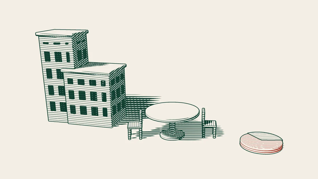 In front of an old building, chairs surround a round table holding a blank decision paper, beside a share disc with one large slice marked.