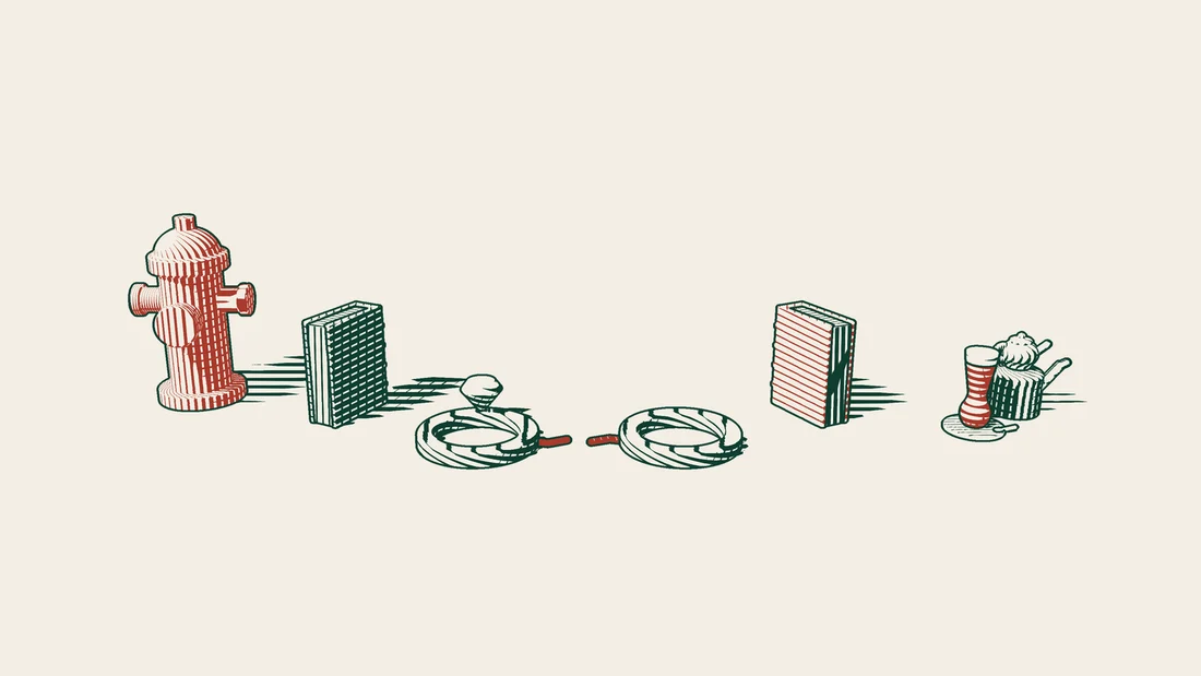 A green-bound book by a red US fire hydrant, a red-bound book by a Turkish tea set, and between them two parted rings and a broken red thread.