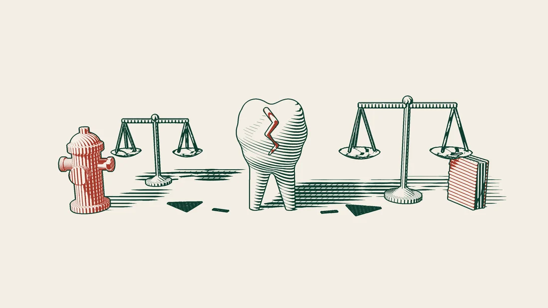 A cracked tooth model between two pairs of scales, one small beside a red fire hydrant and one large beside a red-bound book, with a dashed arrow towards each.