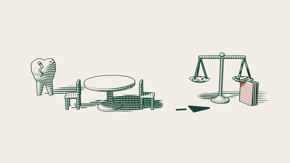 A cracked tooth model beside a round table with a blank paper and two empty chairs, and an arrow path to scales and a red bound book.