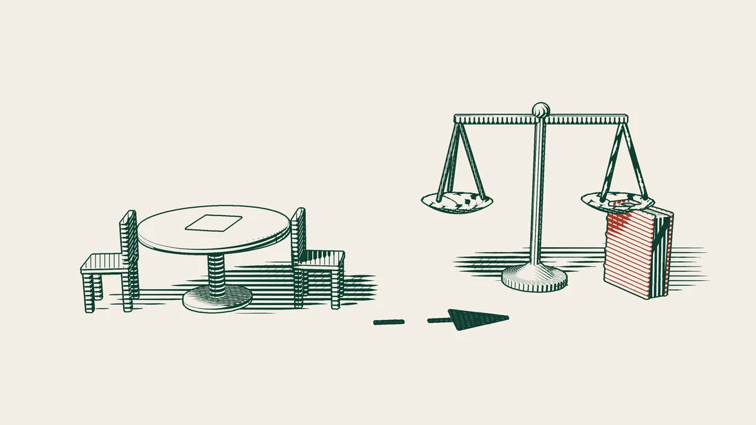 A mediation table with two chairs comes first, followed by an arrowed path to a scale and a red-bound book.