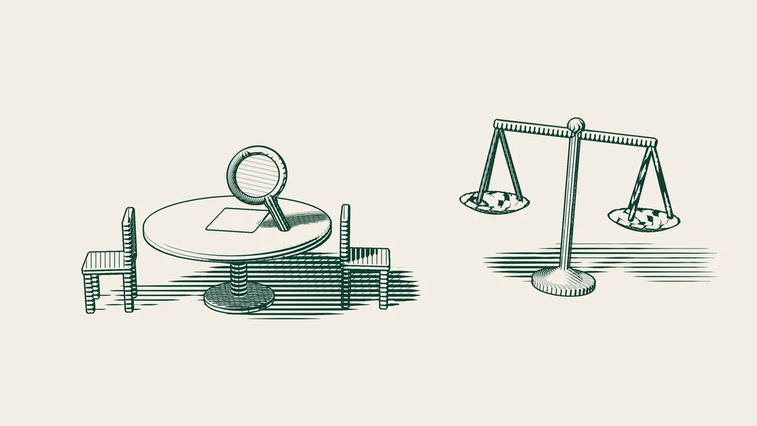 A paper on a board table is examined with a magnifying glass, with a tilted balance scale beside it.