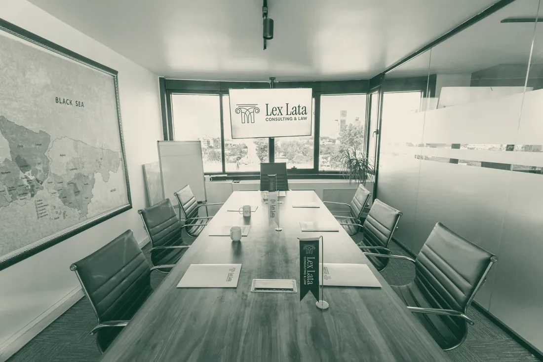 The meeting room of the Lex Lata office in Kağıthane, Istanbul, with a long table and chairs.
