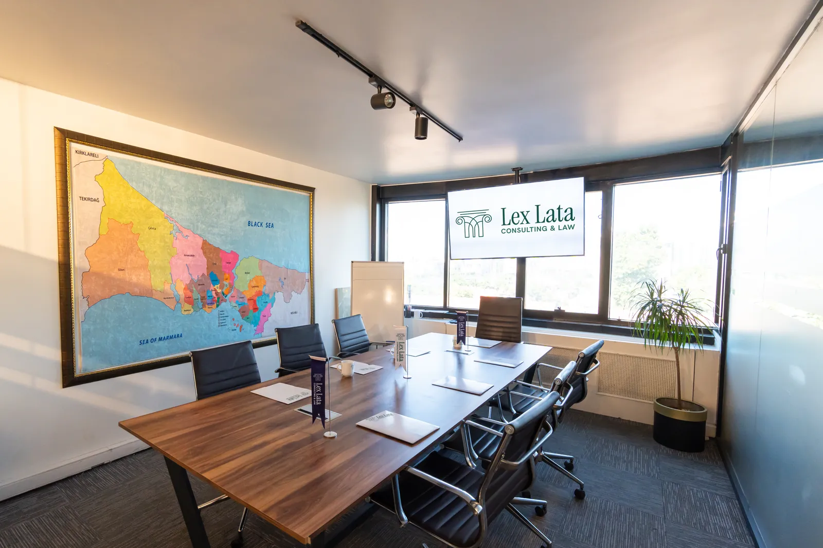 The Lex Lata meeting room seen from the corner, with a map of Istanbul on the wall